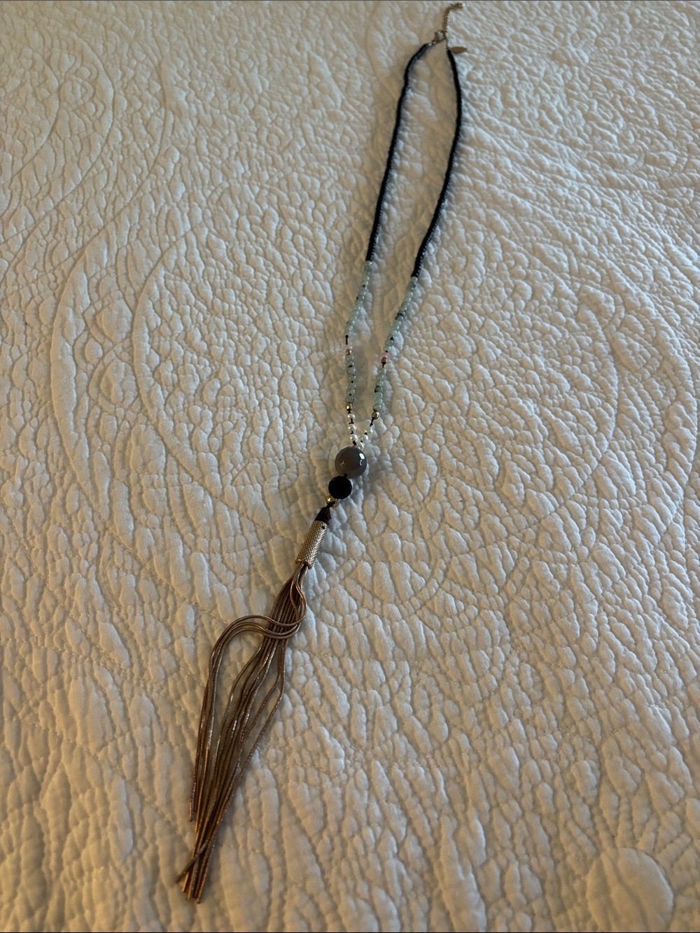 Natasha Couture Beaded Gold Tassel Pendant Necklace in Black and Grey beads